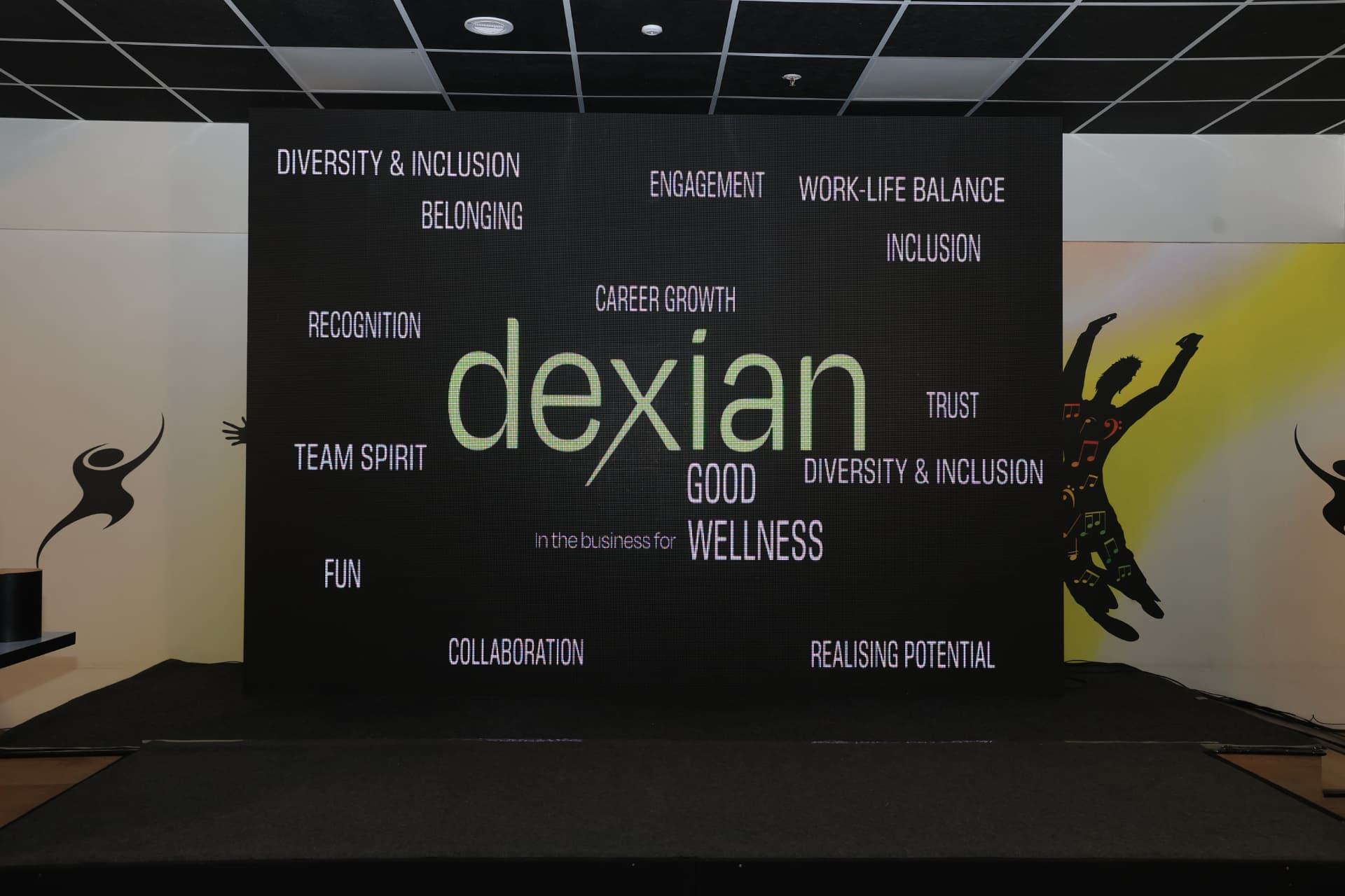 Launch stage LED wall with the program word cloud