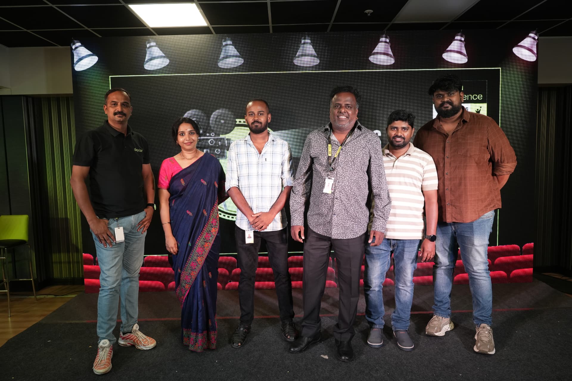 Team on the Lights Camera Action stage set